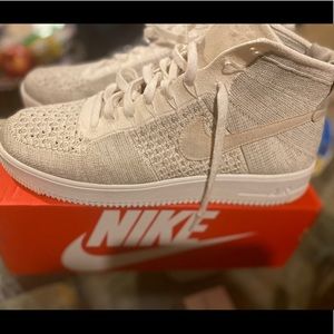 Beige high top Air Force ones